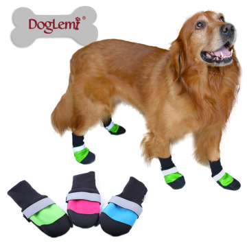 La nieve impermeable del animal doméstico de la mascota de los precios bajos de alta calidad patea la seguridad que refleja los zapatos antideslizantes del perro